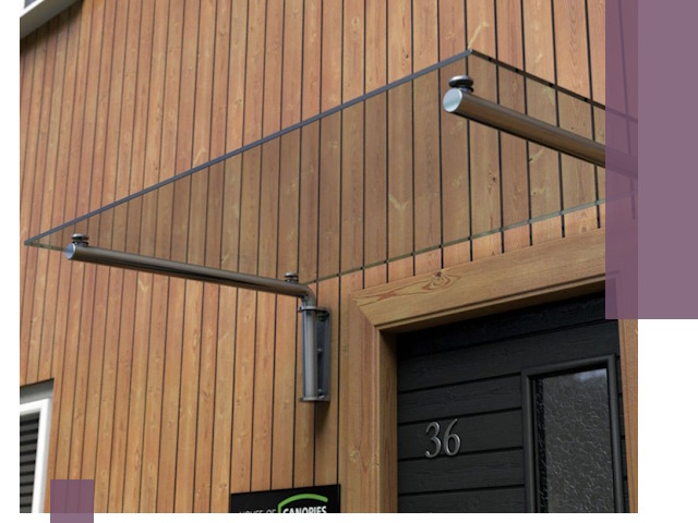 Стеклянные козырьки на входы и фасады в Мирном